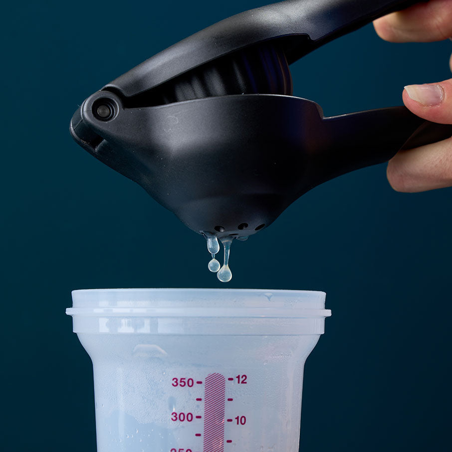 Tupperware® Zest ’N Press® Gadget | Hand-Held Citrus Squeezer &amp; Zester